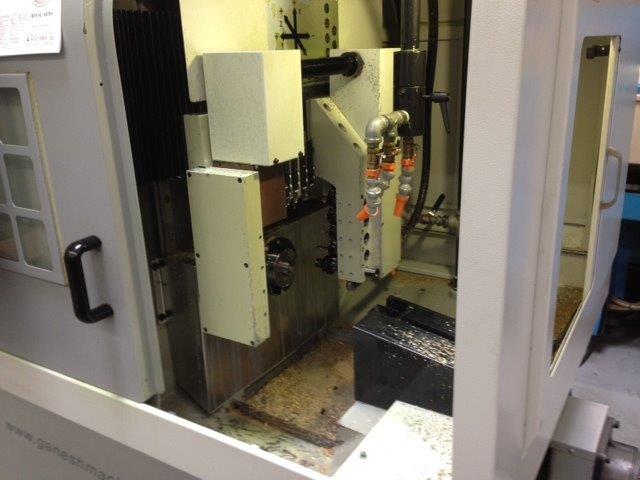 1-1/4 GANESH CYCLONE 32NCY, 2009, 4-axis, Gang, sliding headstock, 7-live tools