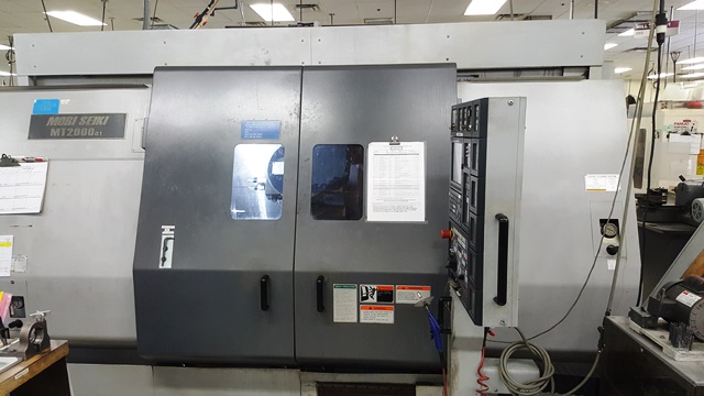MORI SEIKI MT2000A1S, MSG501, 2 1/2 , 2003, B-axis mill-turn, 21x40 cc; 40 ATC
