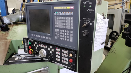 Okuma LB15, OSP 5020L, 8 Chk, 2 , Tailstock, Chip Conveyor, Parts Catcher