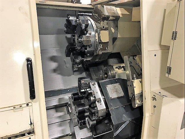 Okuma LU-15II/MW, OSP 7000L, 6 Chk, 1997, 4 Live, Conveyor, Bar Feed