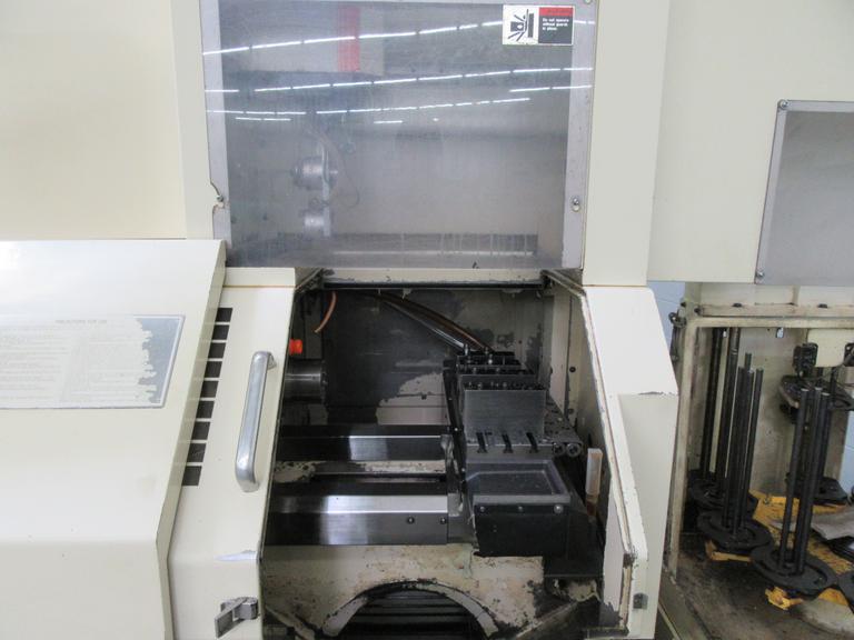 Techno Wasino G6, Fanuc 21I-T, 4 Chk, 1 1/2 , 2000, Robot Loader/Unloader