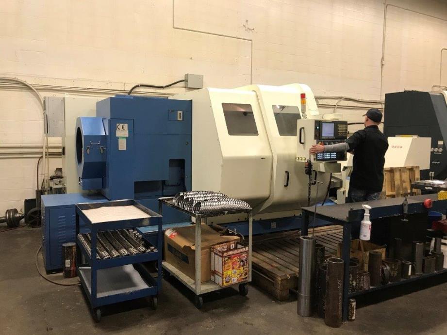 L&L LS 1000X900, Fanuc, 32 Chk, 2010, 2 Chip Conveyors