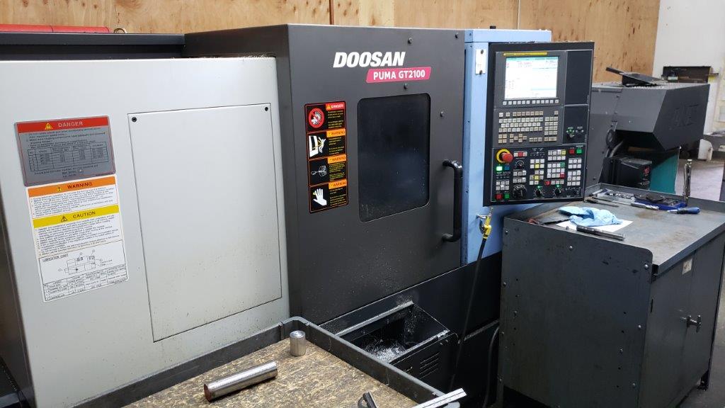 DOOSAN PUMA GT2100, FANUC, 10 Chk, 2 , 2014, TAILSTOCK, CHIP CONVEYOR, BARFEED