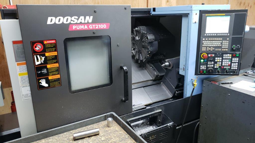 DOOSAN PUMA GT2100, FANUC, 10 Chk, 2 , 2014, TAILSTOCK, CHIP CONVEYOR, BARFEED