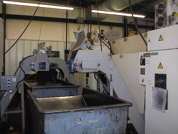 Okuma LCC-15-2S, OSP-7000L, 8 Chk, 2 1/2 , 2-Spindle, 4 Axis, Twin Saddle W/Part Loader/Flip Systems, Gantry loaders, Stack tables, Chip, etc - New 1999