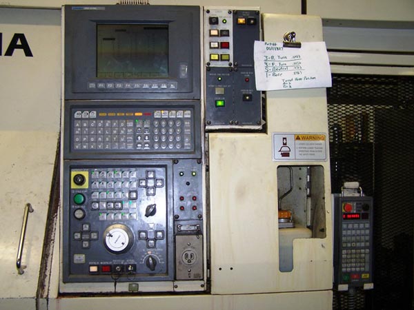 Okuma LCC-15-2S, OSP-7000L, 8 Chk, 2 1/2 , 2-Spindle, 4 Axis, Twin Saddle W/Part Loader/Flip Systems, Gantry loaders, Stack tables, Chip, etc - New 1999