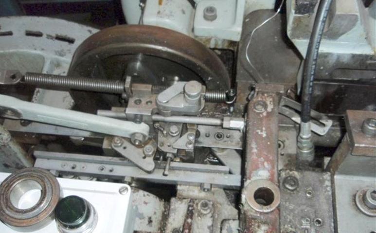 NILSON MODEL #S1F, MECHANICAL 4-SLIDE