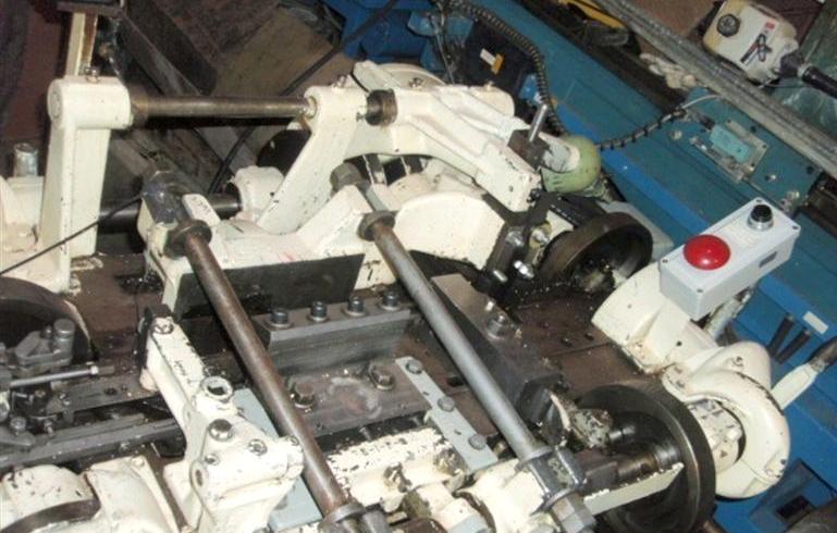 NILSON MODEL #S1F, MECHANICAL 4-SLIDE