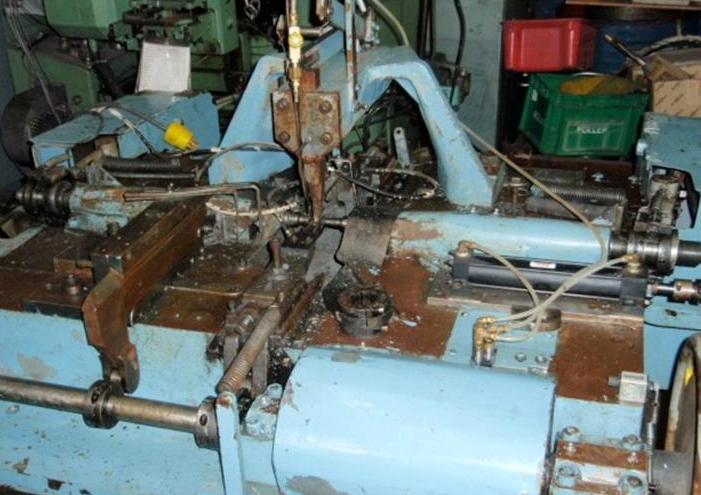 DUAL TORSION SPRING WINDER