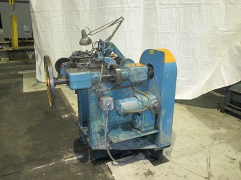 U.S. BAIRD #1 FOUR SLIDE MACHINE WITH WIRE STRAIGHTENER