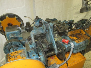 U.S. BAIRD #1 FOUR SLIDE MACHINE WITH WIRE STRAIGHTENER