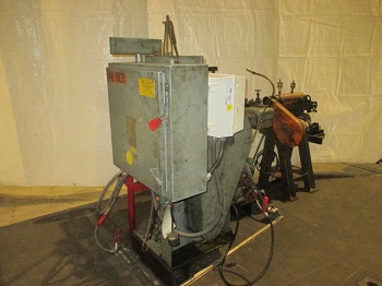 U.S. BAIRD #1 FOUR SLIDE MACHINE WITH STRAIGHTENER AND COIL STAND