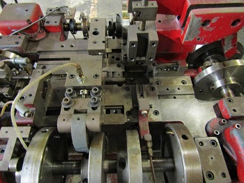 NILSON MODEL# 700-L FOUR SLIDE MACHINE