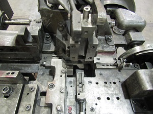 NILSON MODEL #S-2F FOUR SLIDE MACHINE