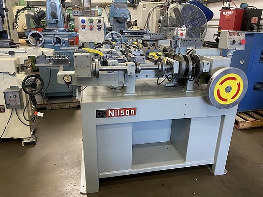 NILSON 751 FOUR SLIDE MACHINE - REBUILT / DUAL SLIDE - COINING