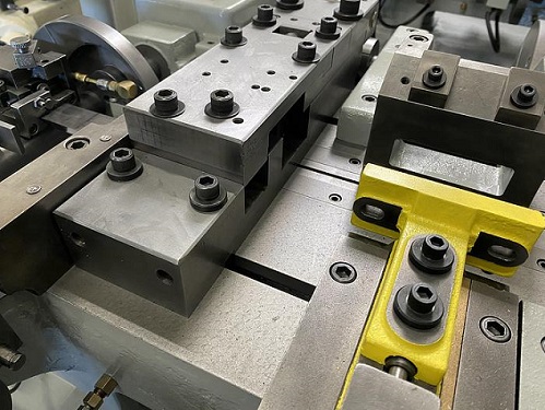 NILSON 751 FOUR SLIDE MACHINE - REBUILT / DUAL SLIDE - COINING