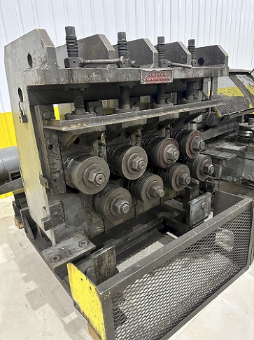 8 STAND SUTTON 2-PLANE FLAT & SHAPE STRAIGHTENER W/ INFEED & OUTFEED TABLES