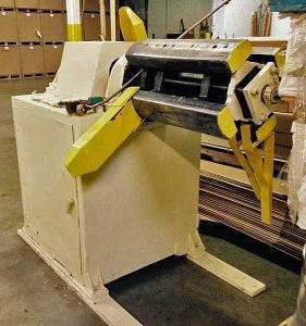 7,500 Lb ROWE Motorized Uncoiler, 17 to 20 ID, 27.5 Width, Loop Control Arm