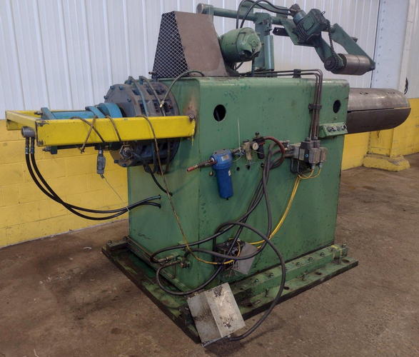 30,000 Lb FORTE Uncoiler, 19 to 25 ID, 60 Width, Motorized Hold Down Arm